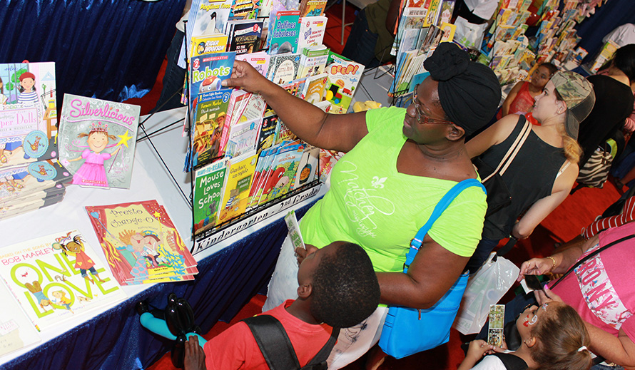 Mother and son shop discounted books.